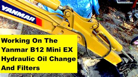 how to change hydraulic oil in mini digger|mini excavator hydraulic fluid.